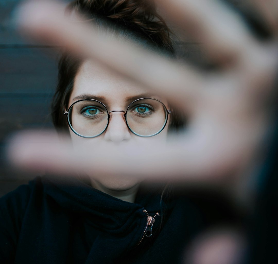Young creative professional man with dark hair and glasses