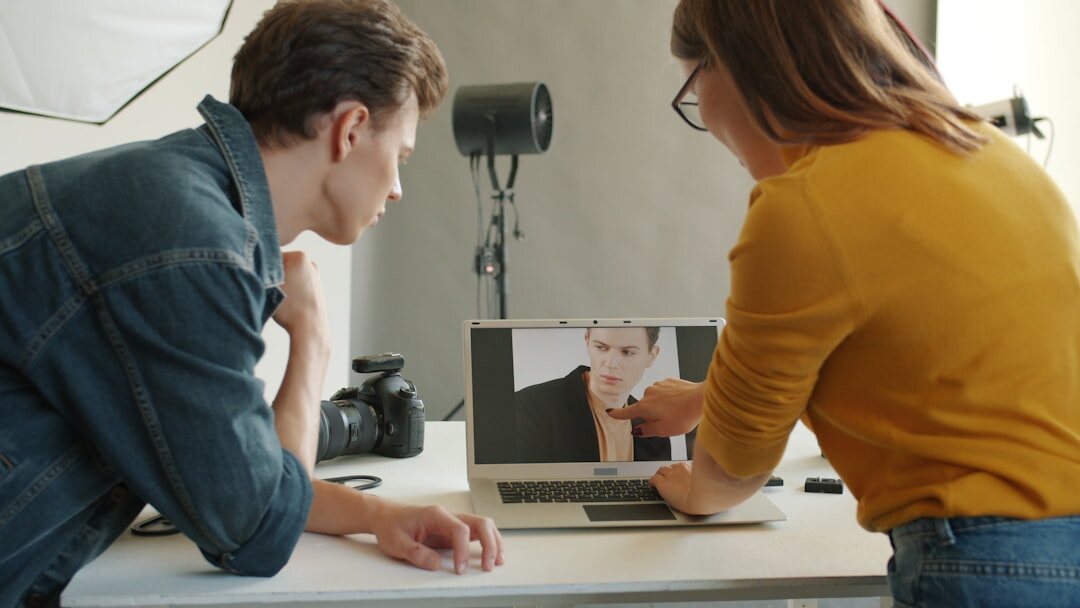 Two professionals conducting a formal video interview in a studio